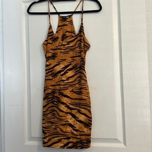 Worn once! Fashion Nova size small “wildest dreams double lined mini dress”